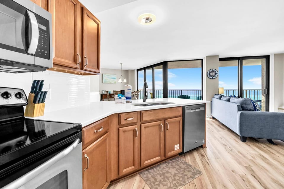 Condo, Multiple Beds (Aquavista 603W) | Private kitchen | Oven, toaster, cookware/dishes/utensils