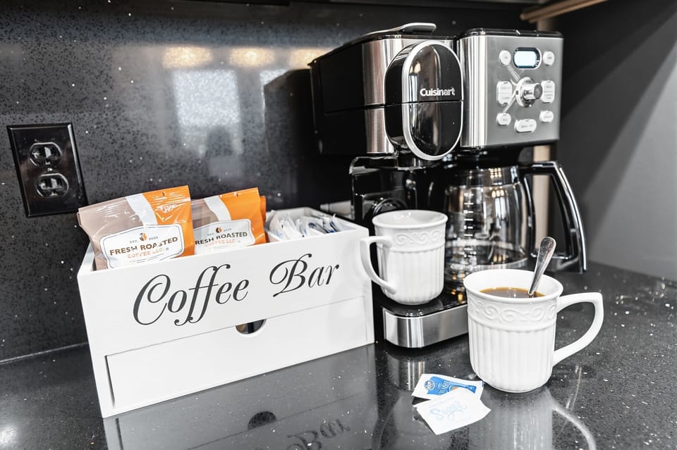 Coffee bar magic. Mornings made easy with drip, Keurig, and plenty of mugs.