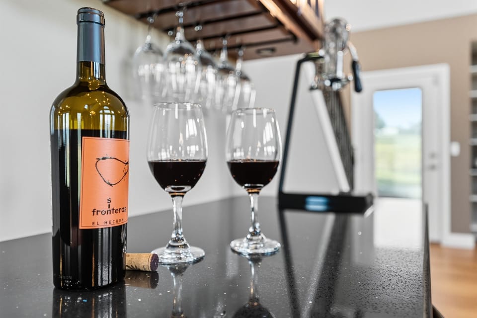 Wine glasses and good vibes. Just add laughter and a bottle of your favorite red.