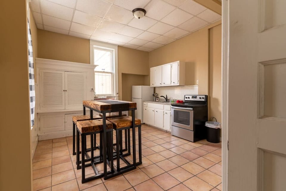 Cook meals together or share stories around the rustic dining island.