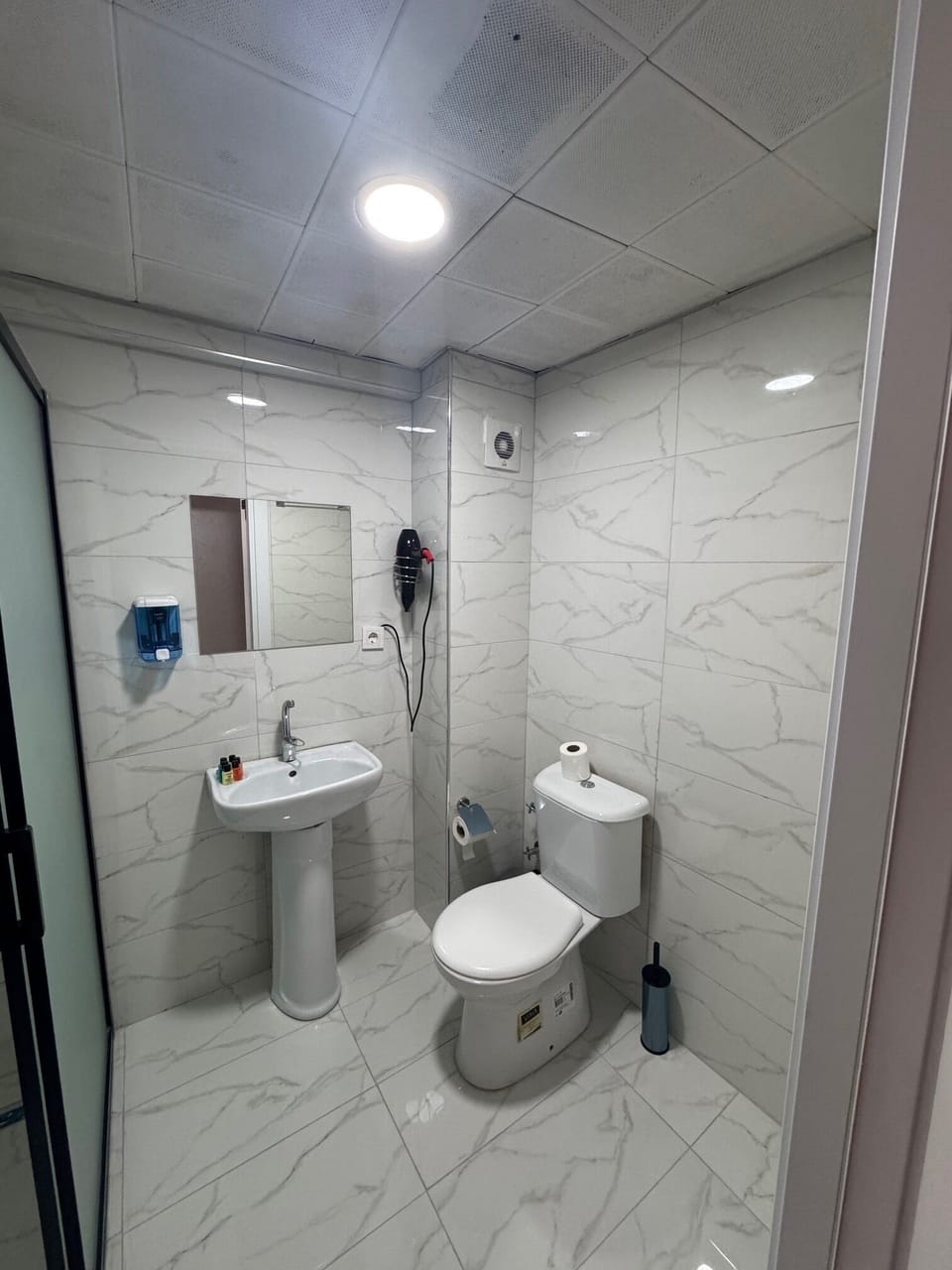 Double Room | Bathroom | Hair dryer, slippers, towels, soap