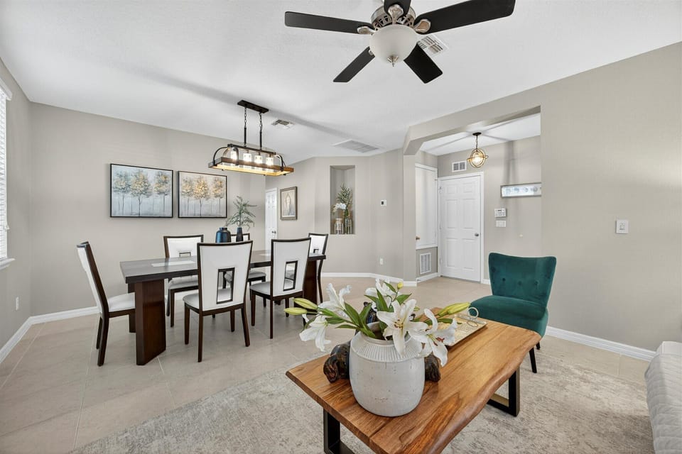 Open dining and living area perfect for gathering and enjoying home-cooked meals.