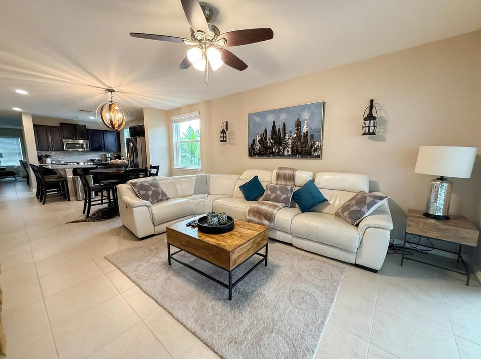 Plush sectional seating and Smart TV — your home away from home. Seats of the couch recline on two sides.