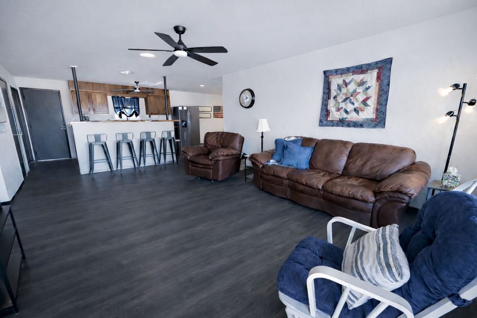 Leather couch and recliner with Glider rocker.
