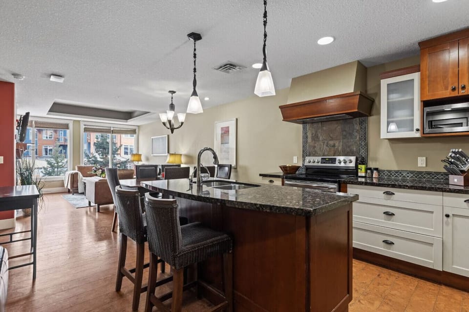 Kitchen island has seating for 2.