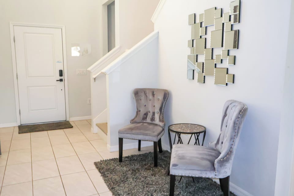 Seating area in front entrance hallway.