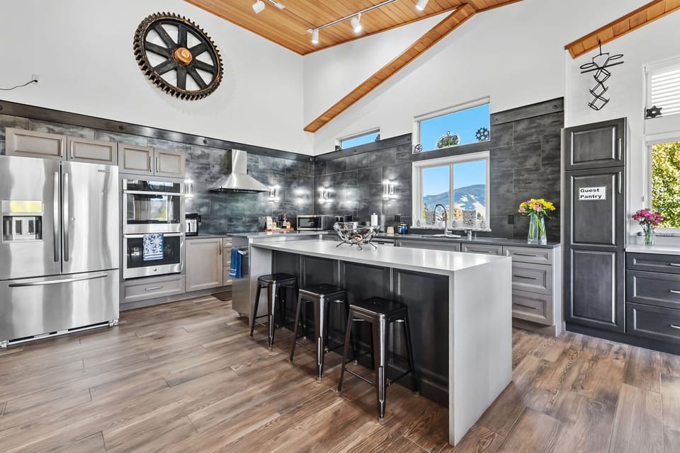 Kitchen: Main floor, drip coffee maker, Keurig, toaster, air fryer, cooking utensils, tableware