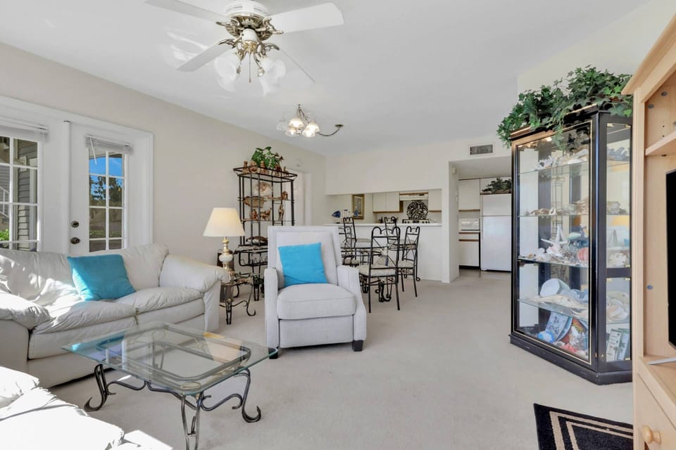 The open plan includes living, dining and kitchen, with bedrooms on oppsite sides of the condo, allowing 2 couples to easily share the space.