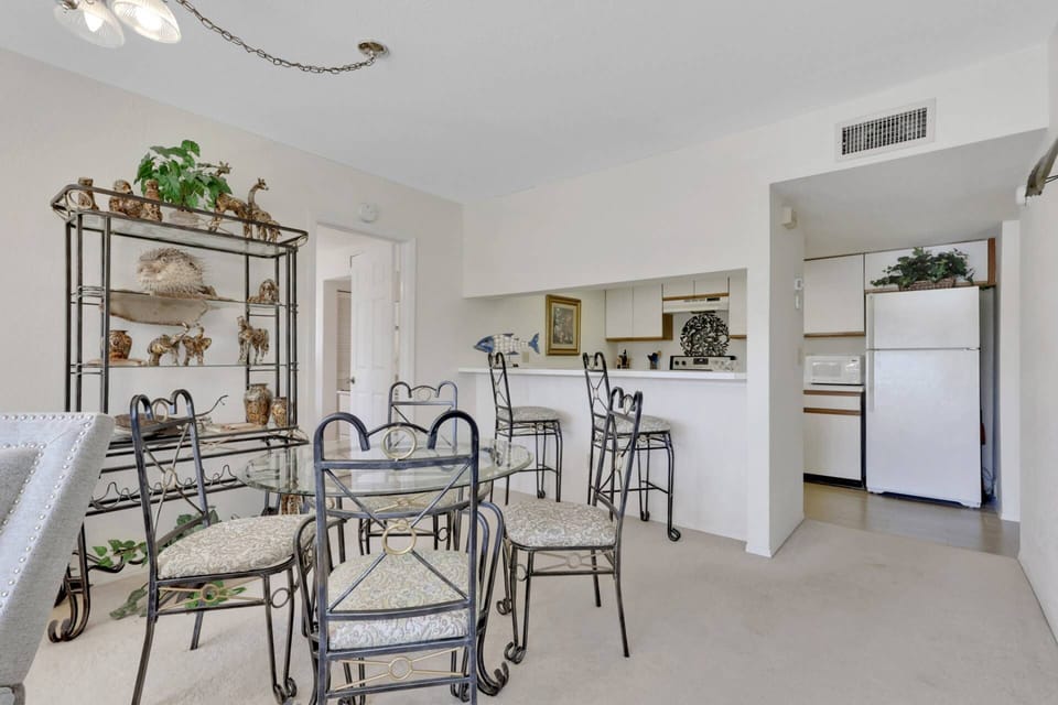 Enjoy your meals or friendly game night at the dining table with seating for 4.