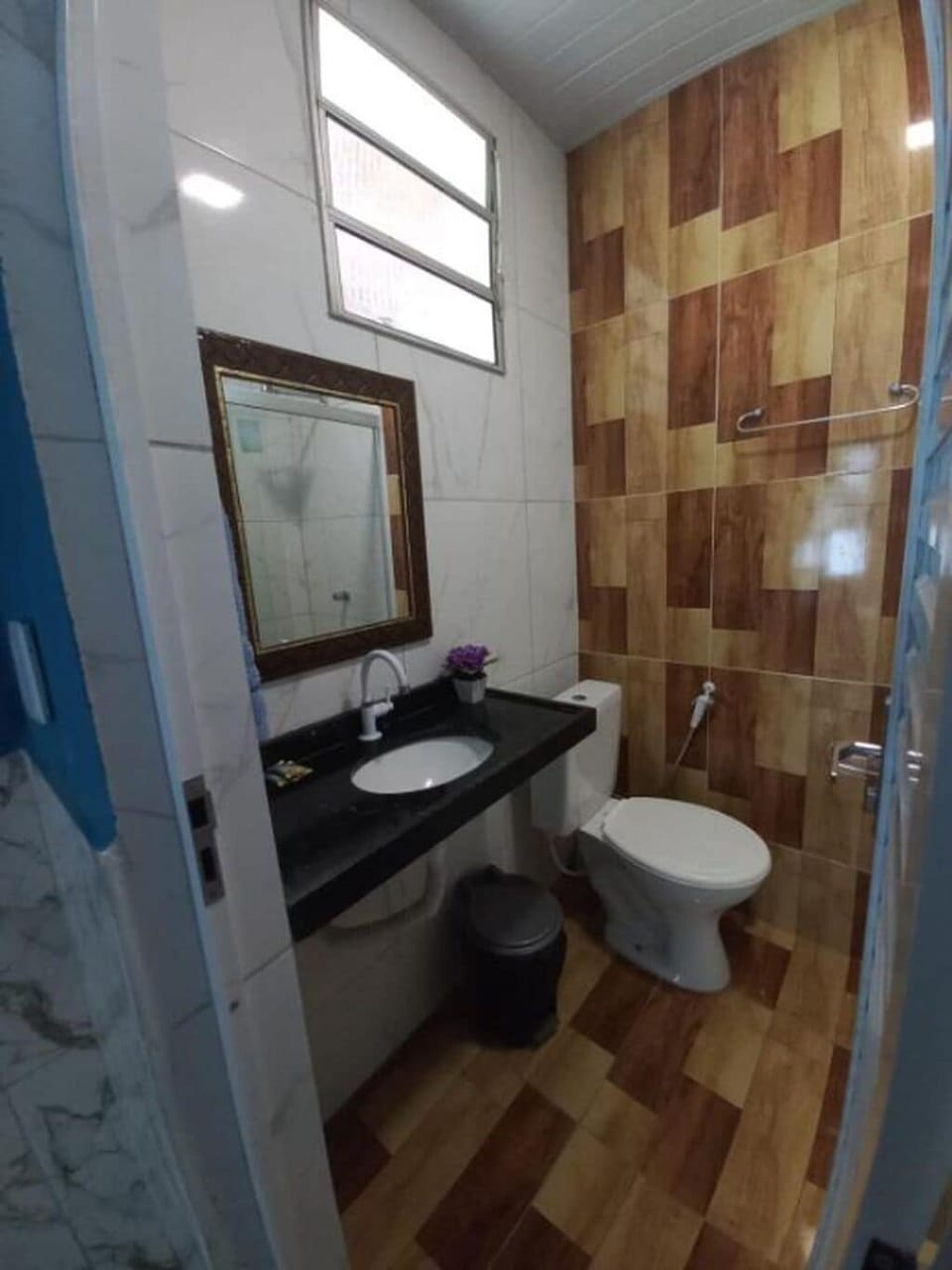 Shower, towels, soap, toilet paper