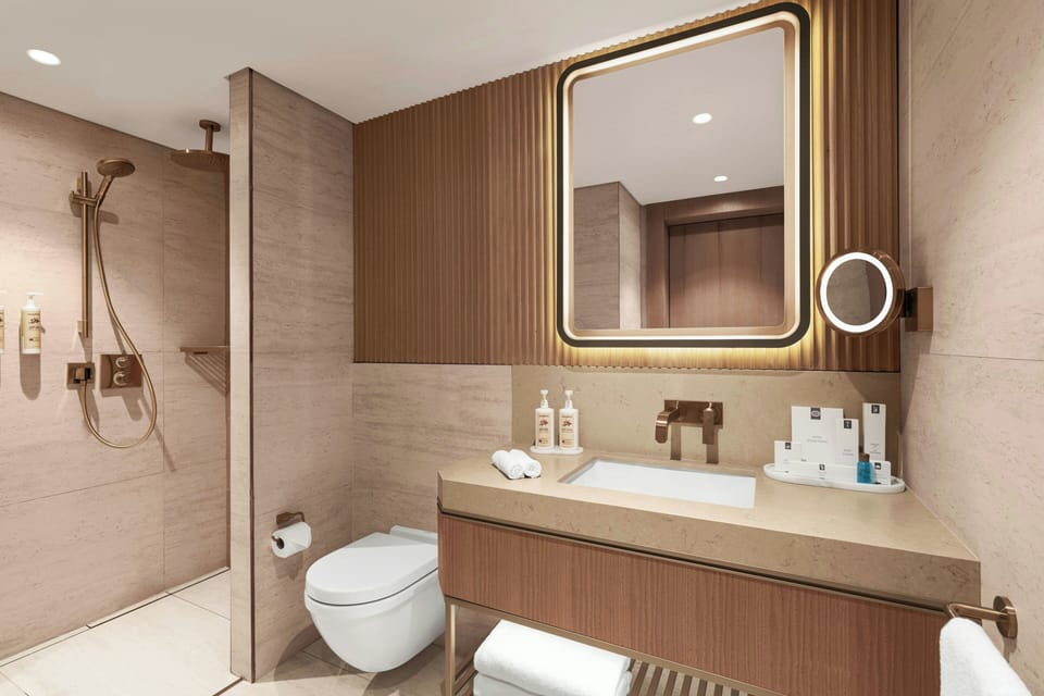 Shower, hydromassage showerhead, eco-friendly toiletries, hair dryer