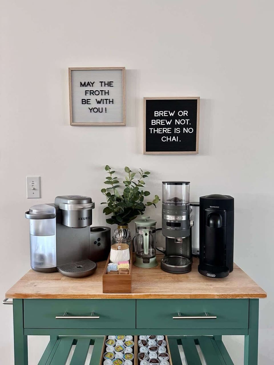 Coffee bar stocked with Keurig and Nespresso machines; French press; Kitchen Aid coffee grinder; and a variety of K-Cup coffee pods, tea pods, and empty reusable pods. (Please note: we do not provide any Nespresso pods.)