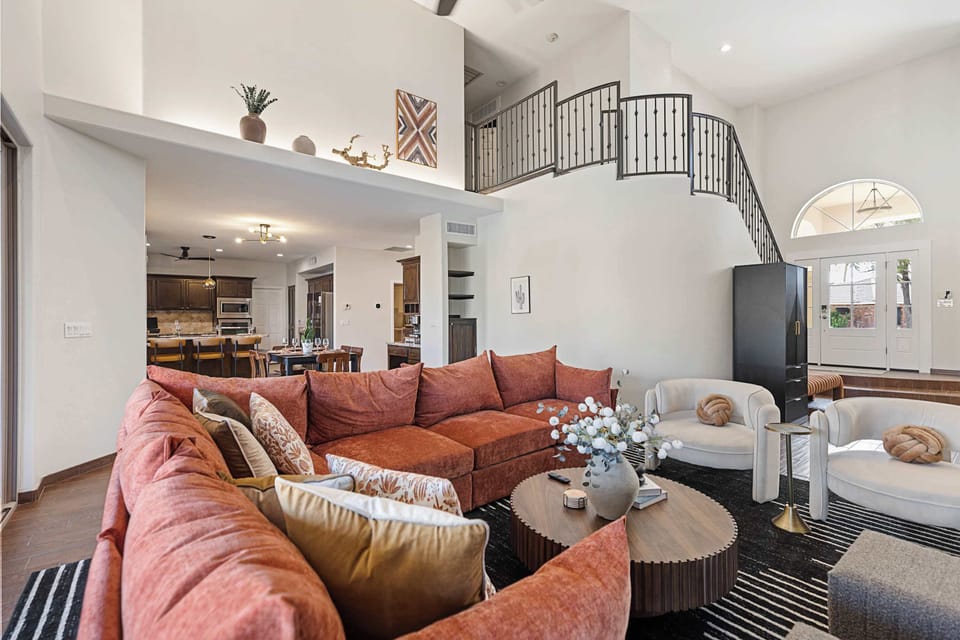 This isn’t just a living room—it’s the life of the home. Think board games on the table, movies on the screen, and laughter echoing through the walls. Gather, relax, repeat.