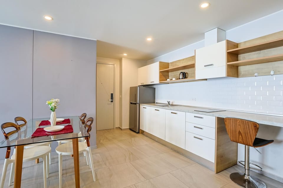 Apartment, Balcony | Private kitchenette | Full-size fridge, microwave, stovetop, electric kettle
