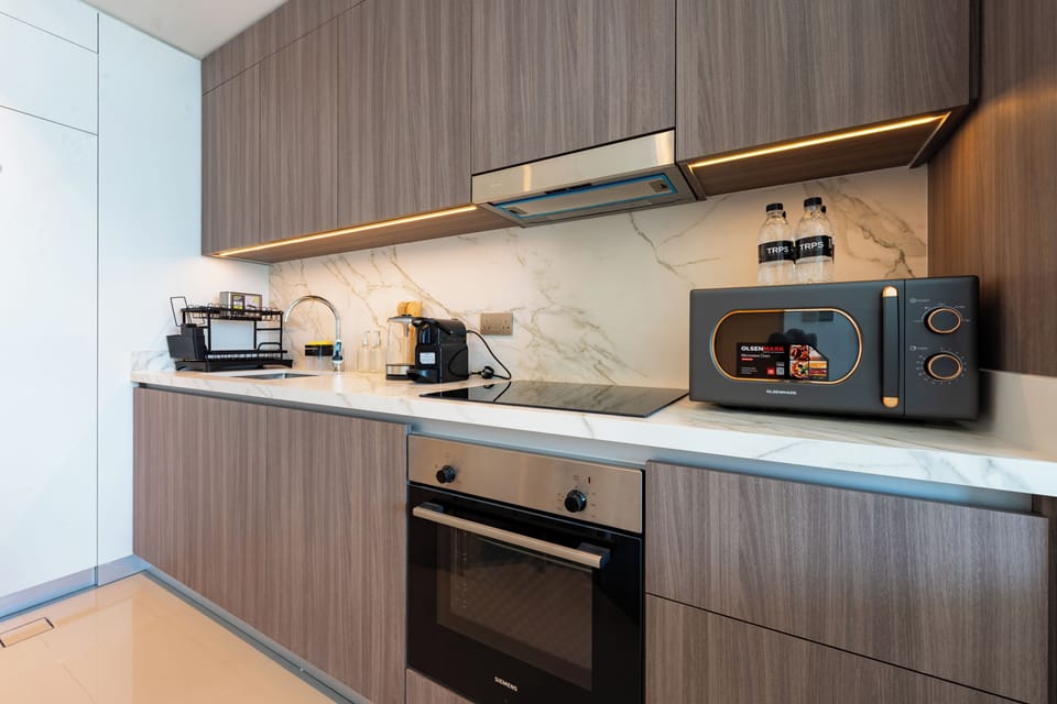 Deluxe Apartment, Balcony, Sea View | Private kitchen | Espresso maker, electric kettle
