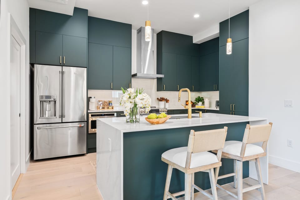 Sleek kitchen with island seating.