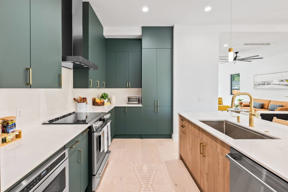 Contemporary kitchen with bold cabinetry.
