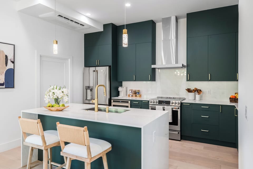 Sleek, modern kitchen with barstool seating.