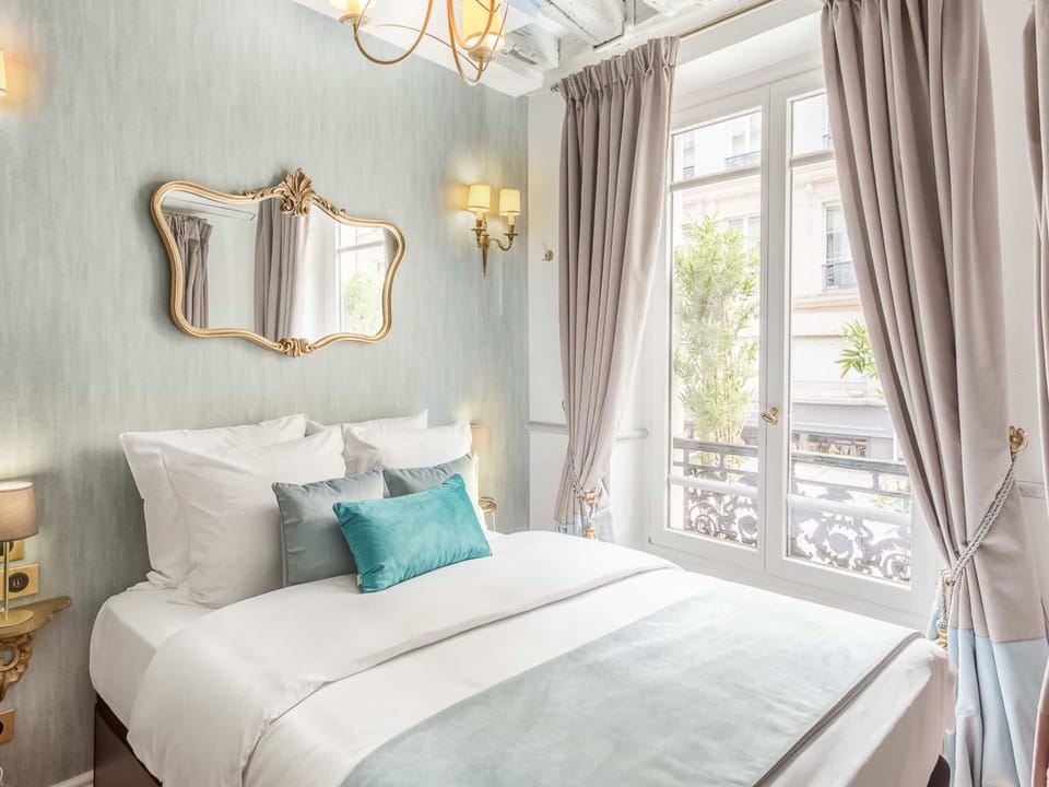 Apartment, City View | Hypo-allergenic bedding, pillowtop beds, in-room safe