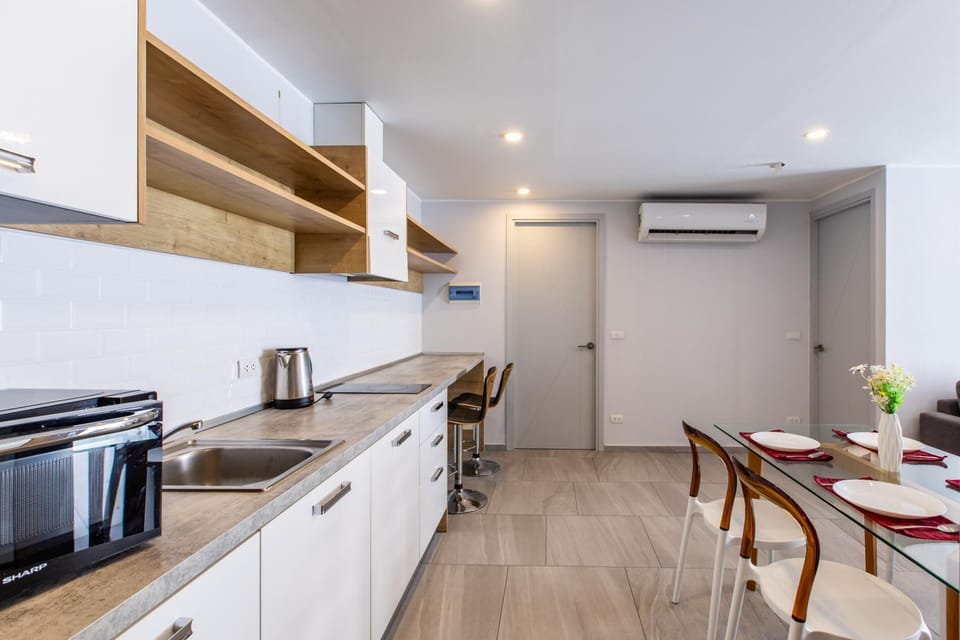 Apartment, Balcony | Private kitchenette | Electric kettle