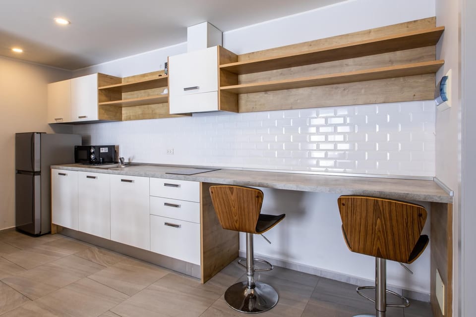Apartment, Balcony | Private kitchenette | Electric kettle