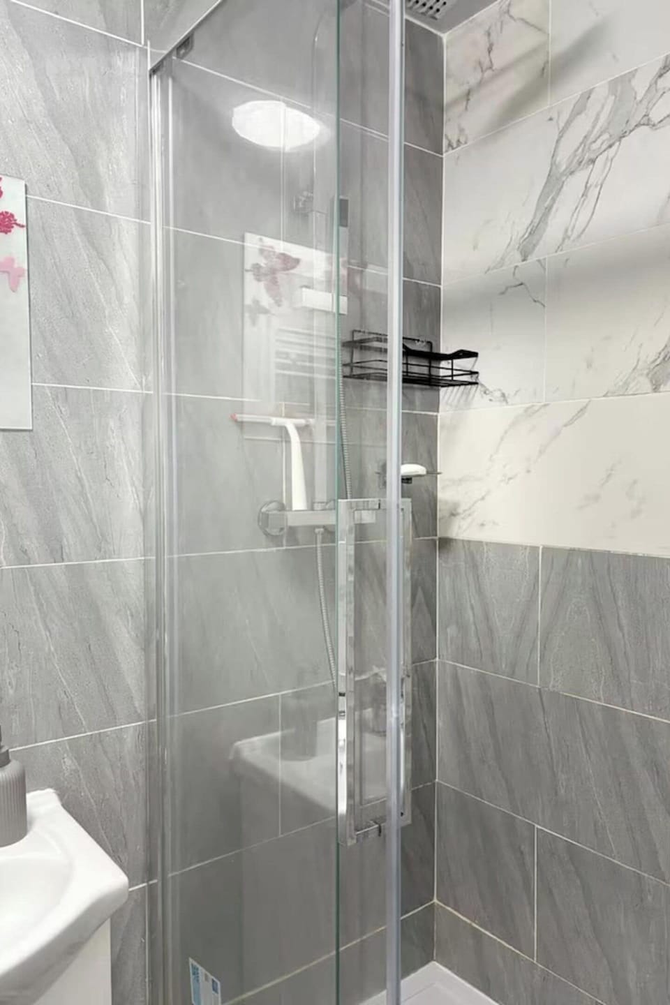 Shower, towels, toilet paper