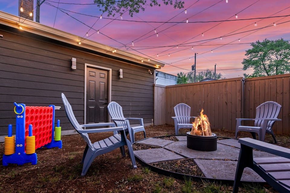 Gather around the fire pit under twinkling lights for unforgettable evenings!