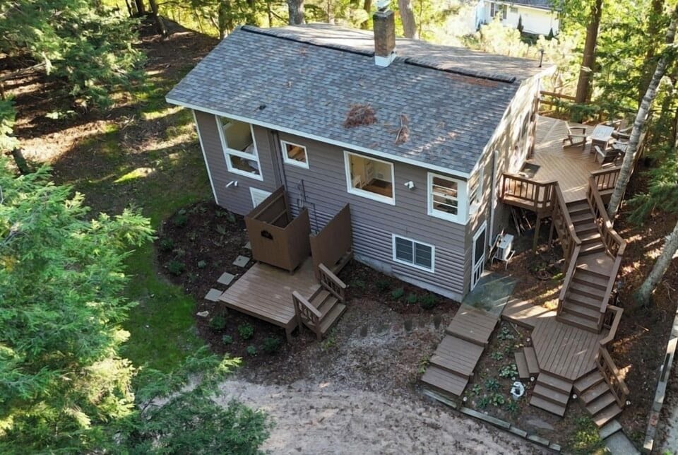 OVERVIEW:  Aerial photo of the entire cottage from the front.