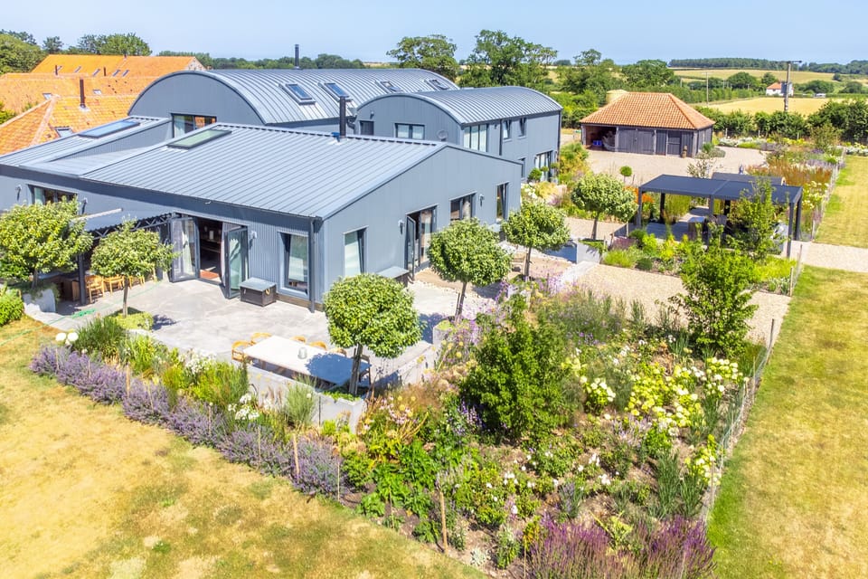 Indigo Barn, Warham near Wells-next-the-Sea: A birds-eye view of the beautifully landscaped garden just minutes away from the coast