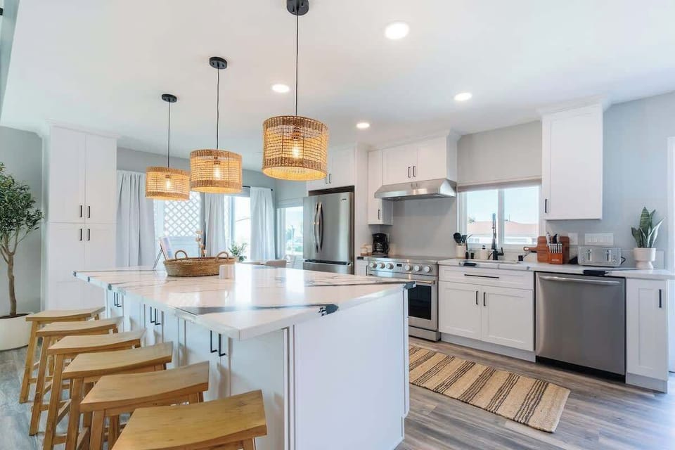The modern, chef-friendly kitchen comes fully equipped for your stay