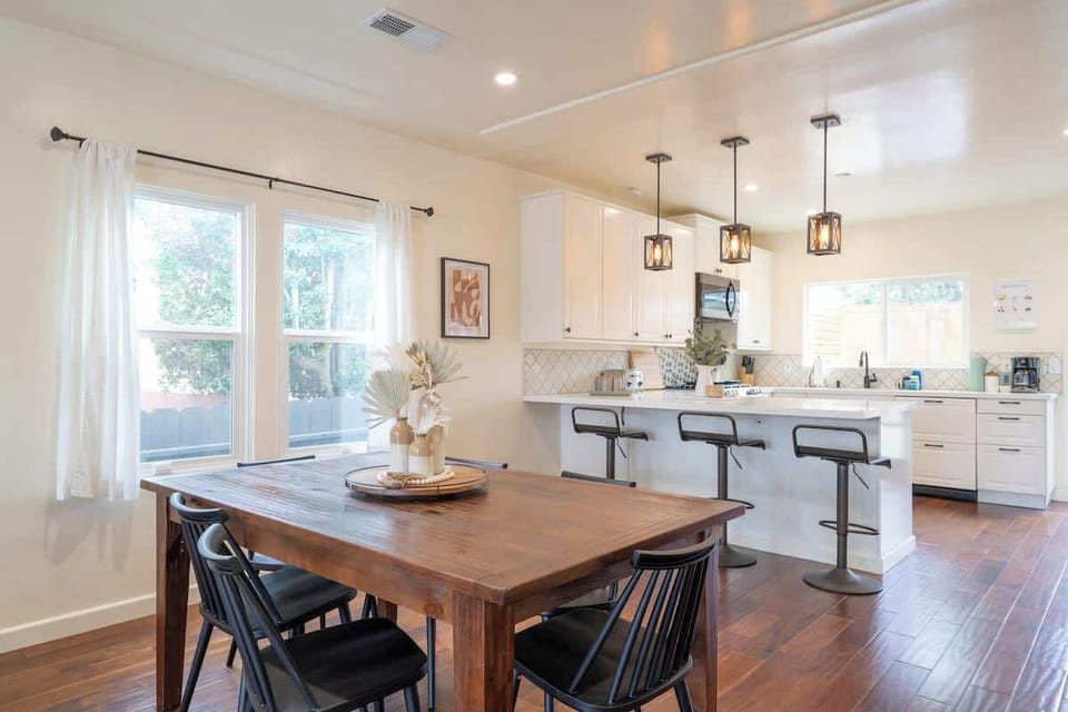 Enjoy a stack of pancakes at the stylish dining table or up at the breakfast bar