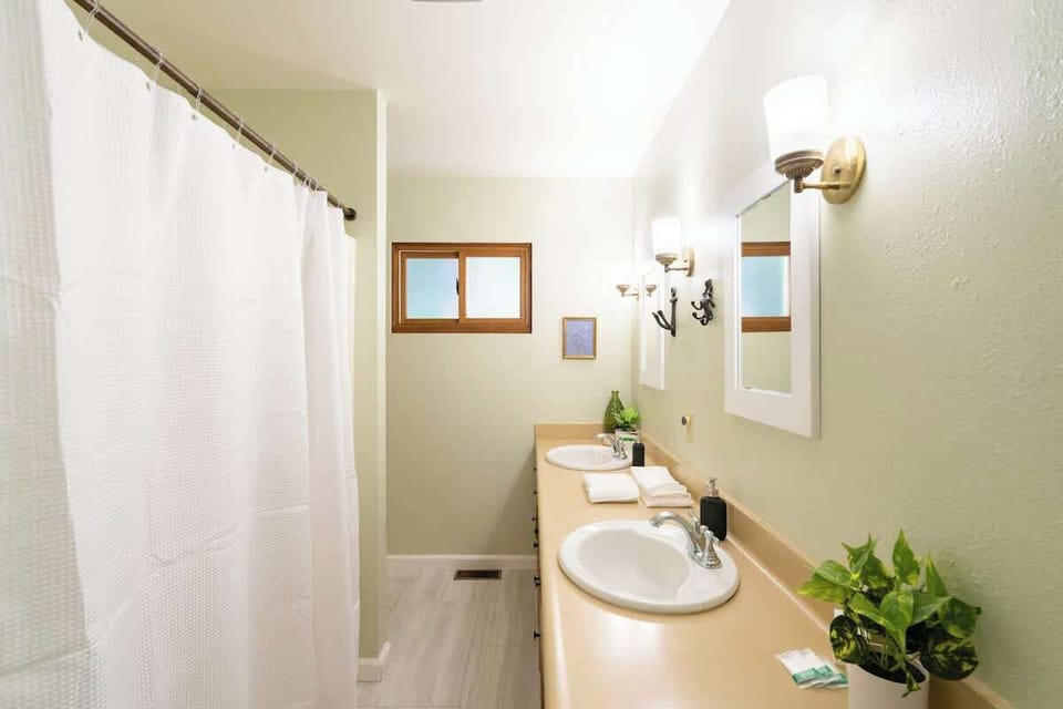 The jack and jill bathroom connects bedrooms two and three