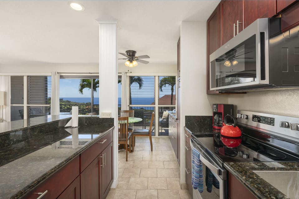 Condo, 2 Bedrooms | Private kitchen | Fridge, oven, coffee/tea maker, toaster