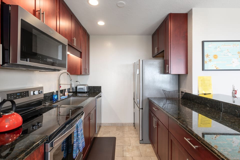 Condo, 2 Bedrooms | Private kitchen | Fridge, oven, coffee/tea maker, toaster