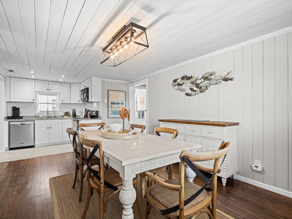 Casual coastal dining at its best. Bright, cheerful, and connected to the kitchen for easy, relaxed meals.