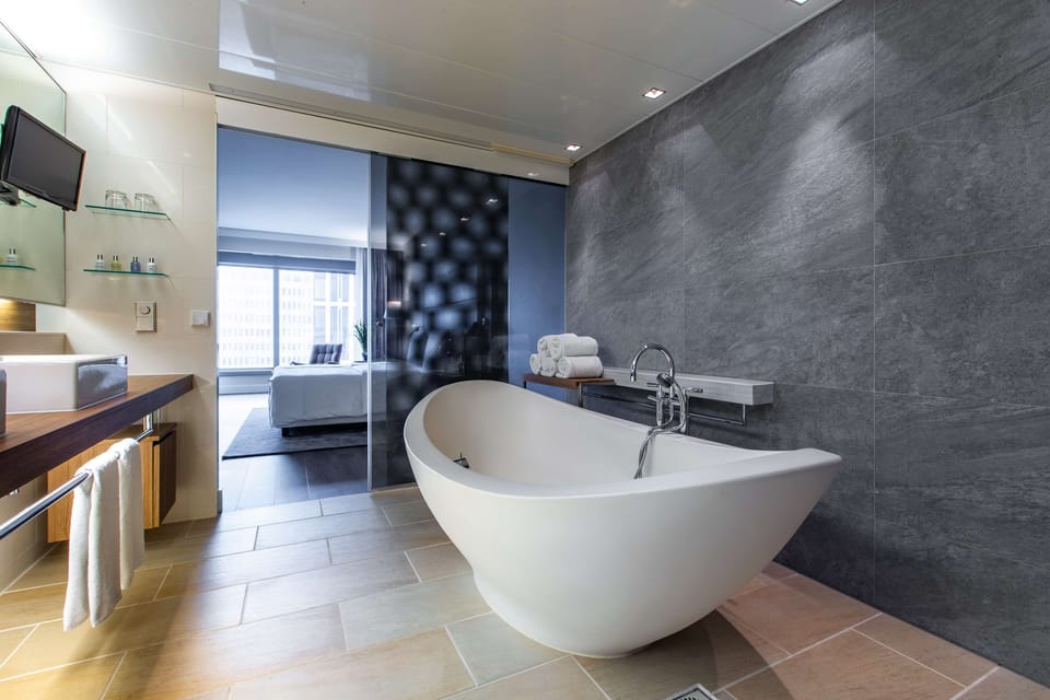 Shower, eco-friendly toiletries, hair dryer, towels