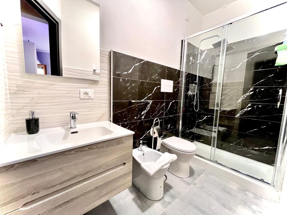 Classic Double Room, Balcony, Partial Sea View | Bathroom | Shower, free toiletries, hair dryer, bidet