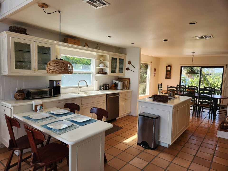 Open kitchen with built-in eating area