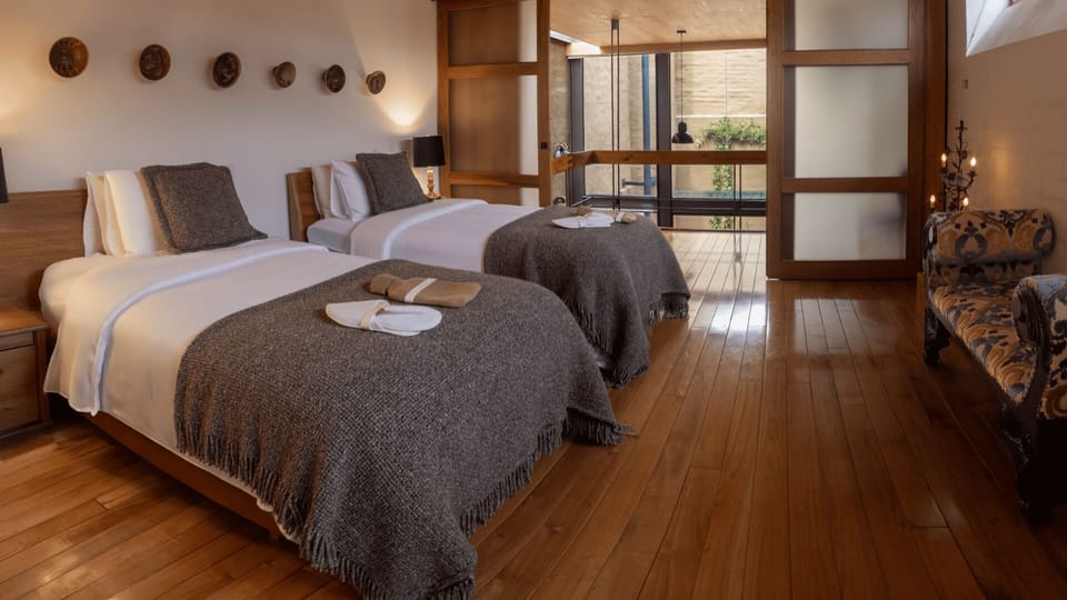 Luxury Suite, Balcony, City View | In-room safe, blackout drapes, iron/ironing board, WiFi (free)