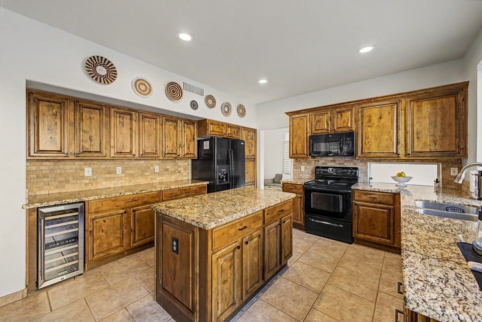 Gourmet Kitchen: Whip up culinary delights in this spacious kitchen with granite counters and plenty of room to cook.