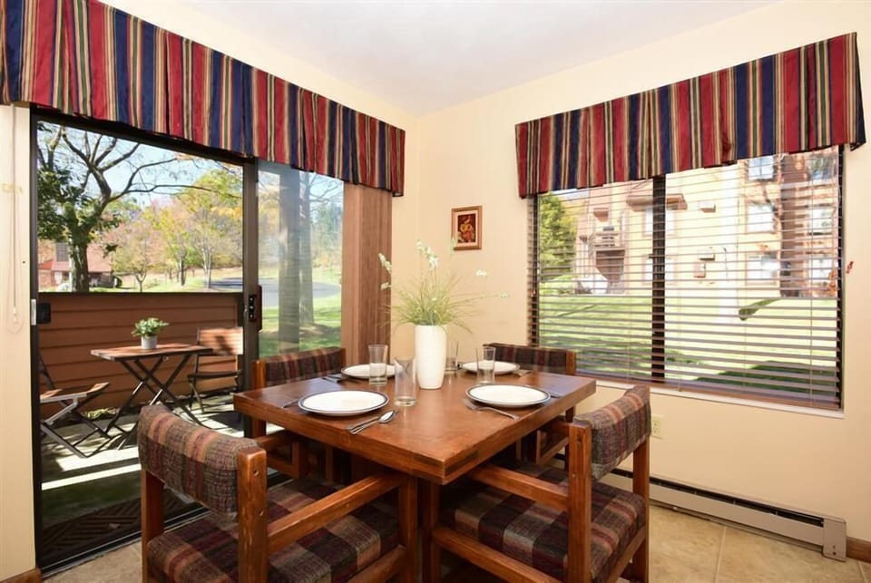 Sunny dining area with scenic views, ideal for lingering over breakfast or planning your day’s activities.