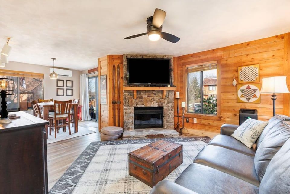 Warm, inviting living space where rustic charm meets comfort—perfect for unwinding after a day of adventure.