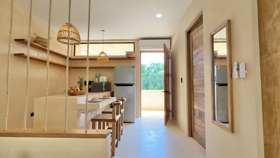 Deluxe Apartment, Balcony, Pool View | Private kitchen | Microwave, stovetop, cookware/dishes/utensils