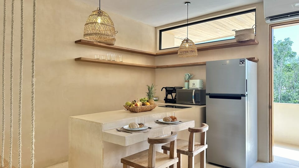 Deluxe Apartment, Balcony, Pool View | Private kitchen | Microwave, stovetop, cookware/dishes/utensils
