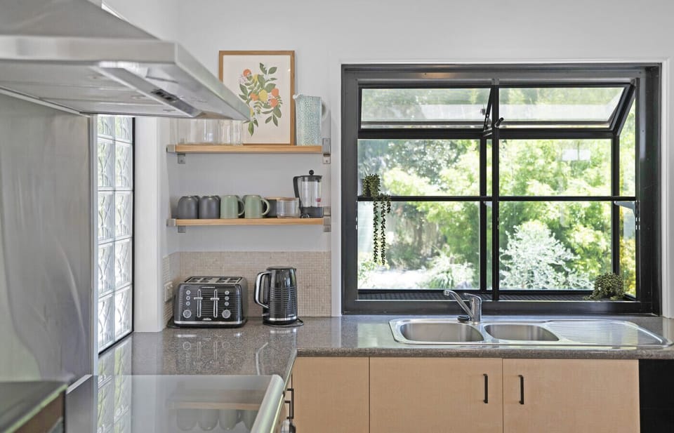 Fully equipped kitchen with gas stove and kitchen island