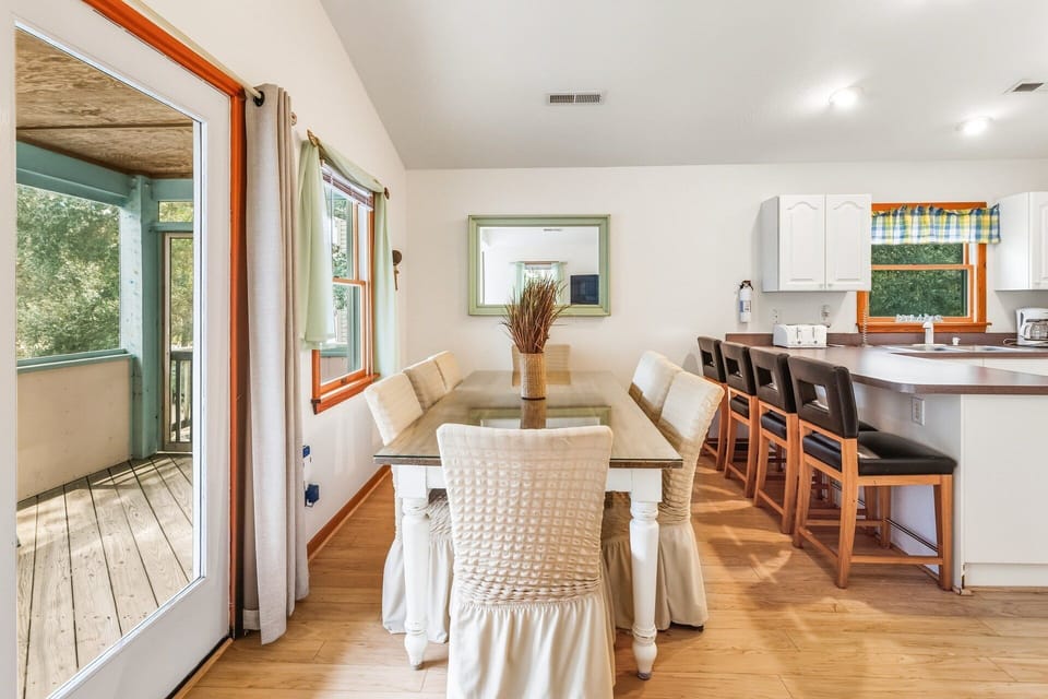 Share family meals or game-night snacks at the dining table with seating for eight.