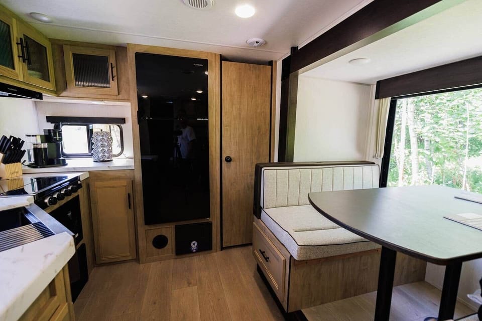 Kitchen and dining table that turns into a bed for kids.