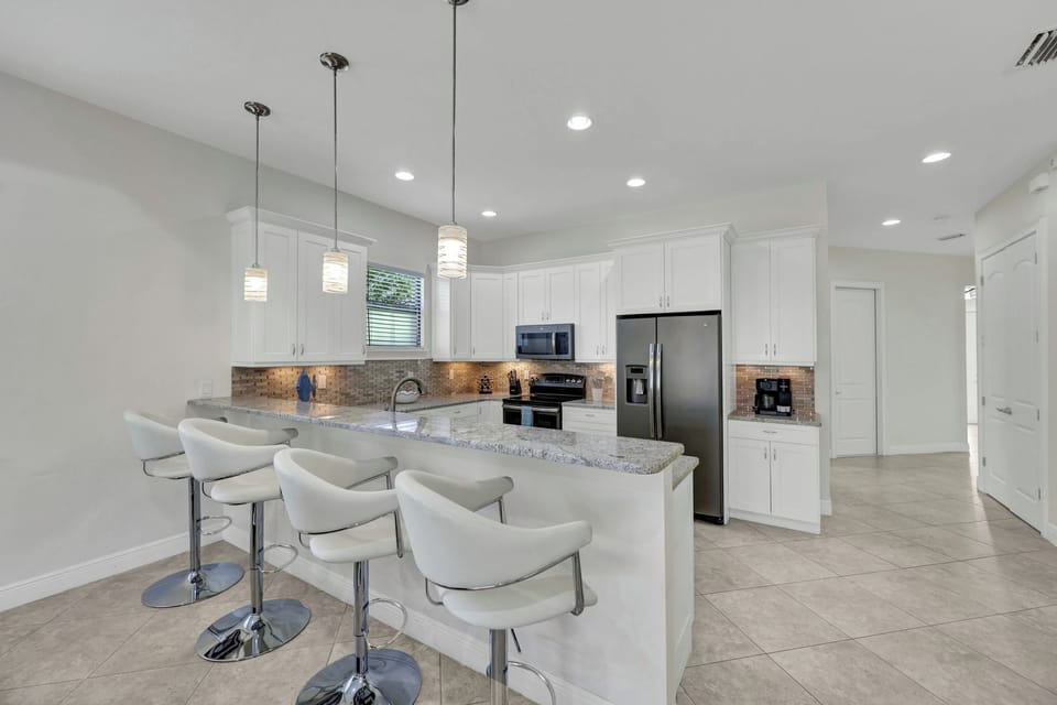 Sip, snack, and socialize—this is the heart of the home where mornings begin and evenings unwind