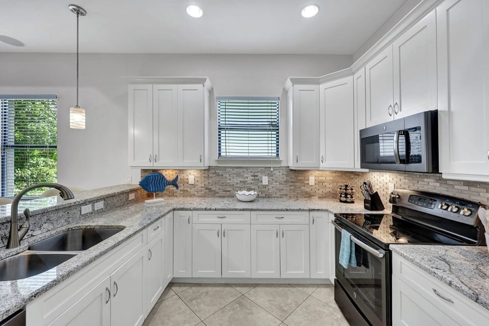 Enjoy a clean, modern kitchen stocked with the cooking basics—perfect for easy vacation meals