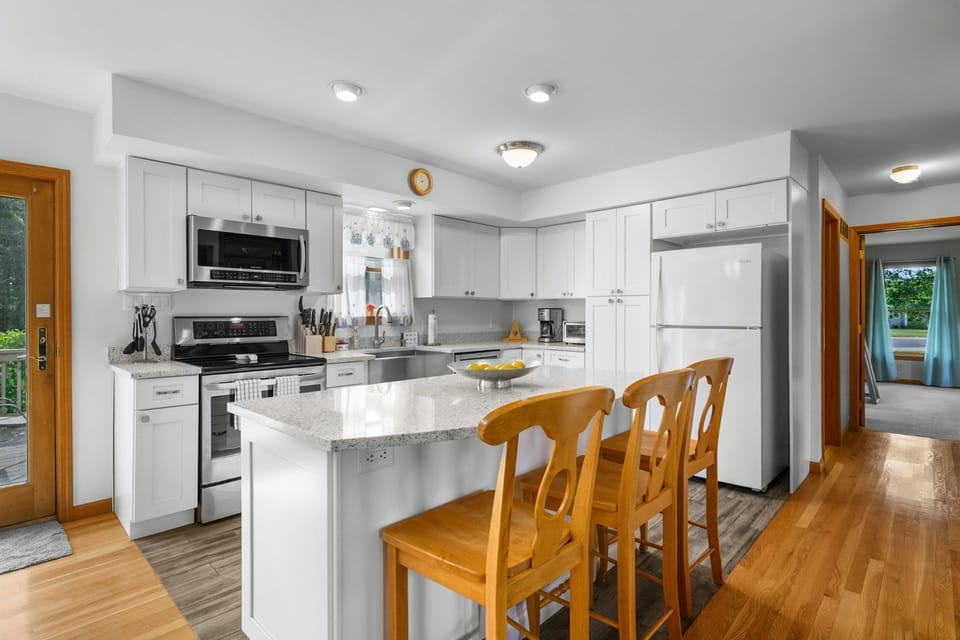 Kitchen and island with seating
